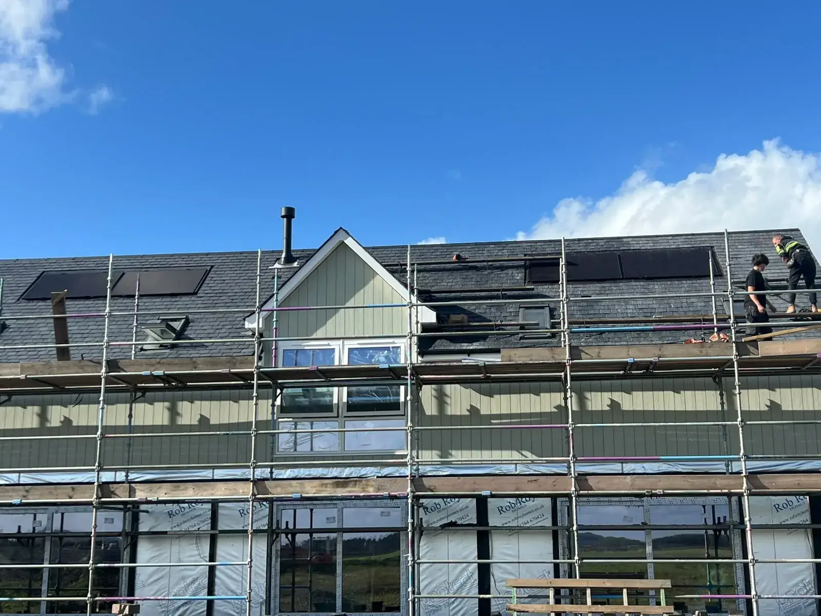 New natural slate roof with dormer and roof windows fitted by AGM Roofing