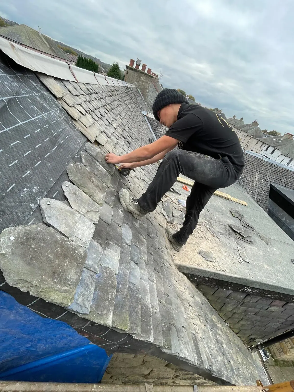 Slate valley repair work in progress on a Central Scotland roof