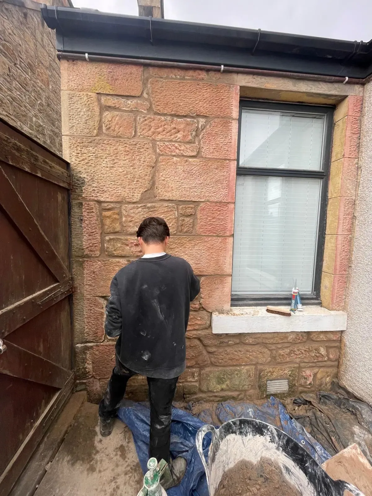 Stonework repointing and lintel repair on a traditional Falkirk property